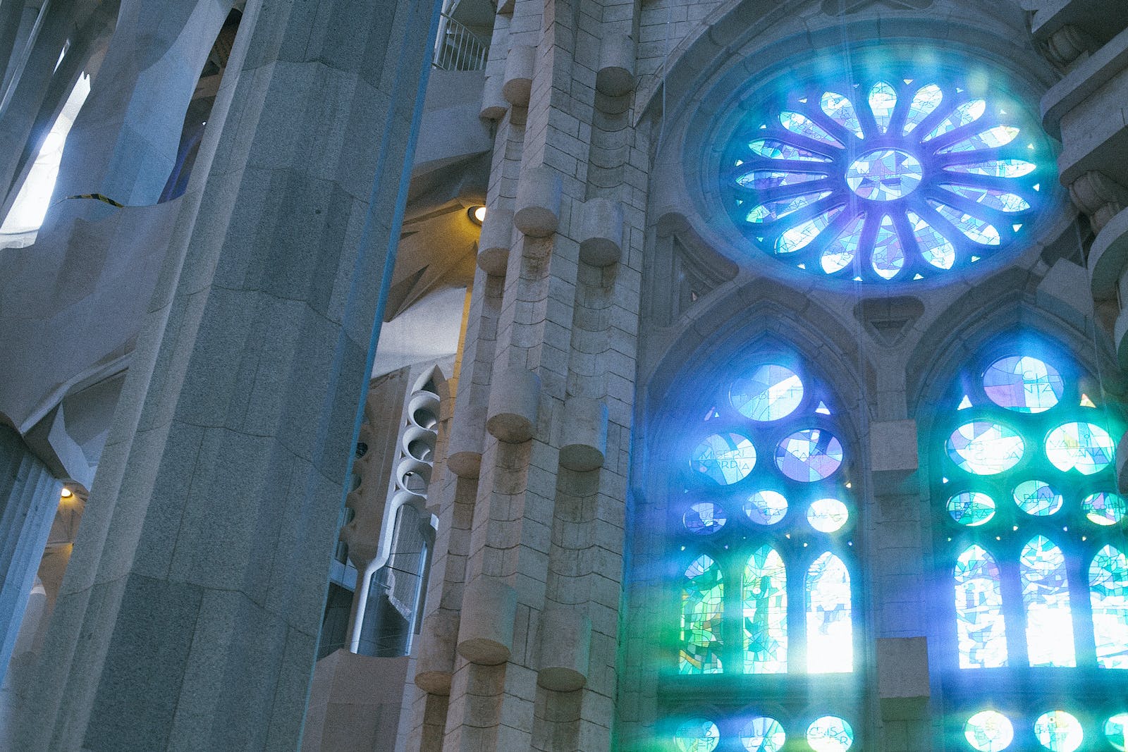 Low angle of old catholic basilica with stained glass windows named Sagrada Familia located in Barcelona in Spain